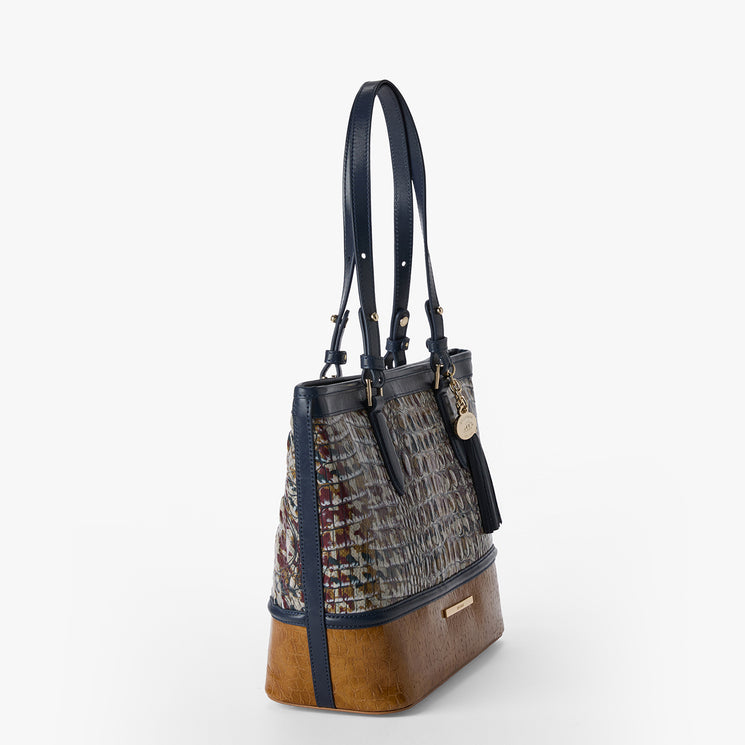 Multicolored patterned Medium Asher handbag with brown accents on a white background. Side view.