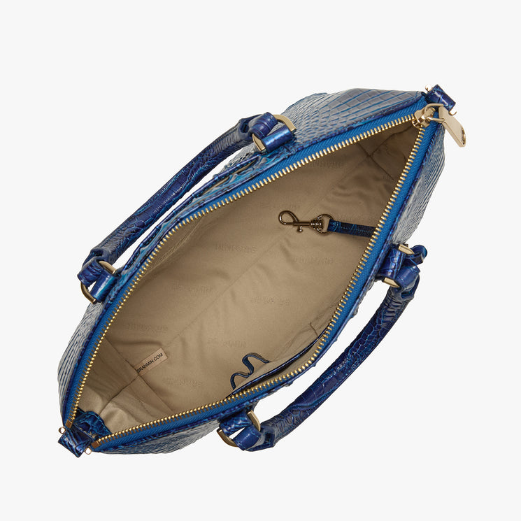 Brahmin blue textured handbag with gold zipper, two top handles, tan interior, inner pockets, and key clasp. Shown open for a spacious view of the interior. Ideal tote silhouette and refined hardware details.