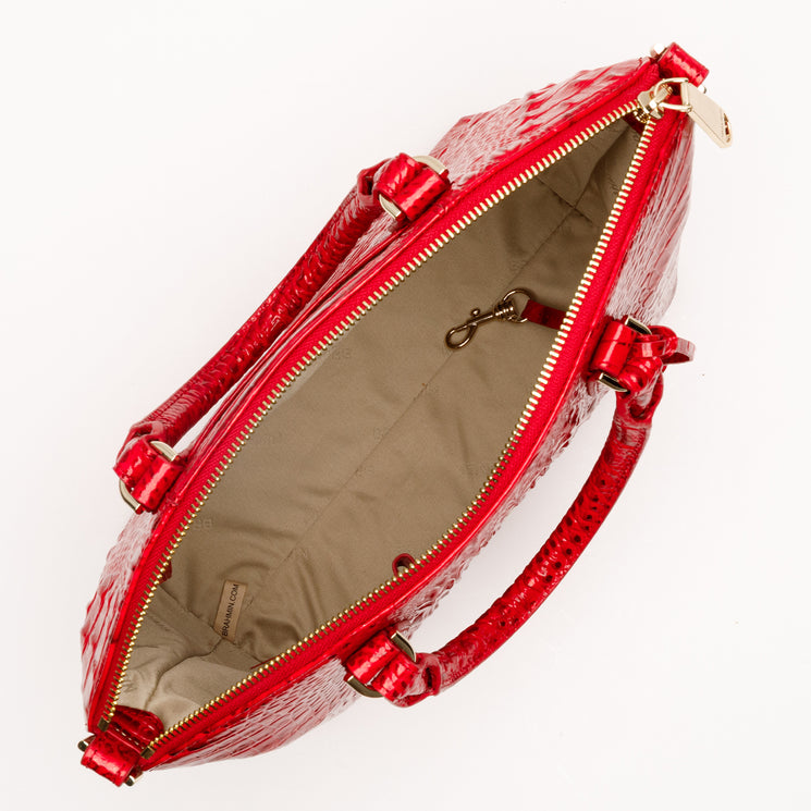 Top-down view of a Tinsel Red Brahmin Duxbury Satchel featuring a croc-embossed texture, gold-tone hardware, two rolled handles, and an open, fabric-lined interior with a lobster-claw key clip.