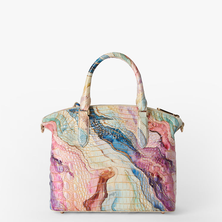 Colorful handbag with a marbled pattern on a white background. Duxbury satchel back view.