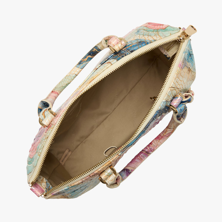 Colorful handbag with a marbled pattern on a white background. Duxbury satchel open top view.