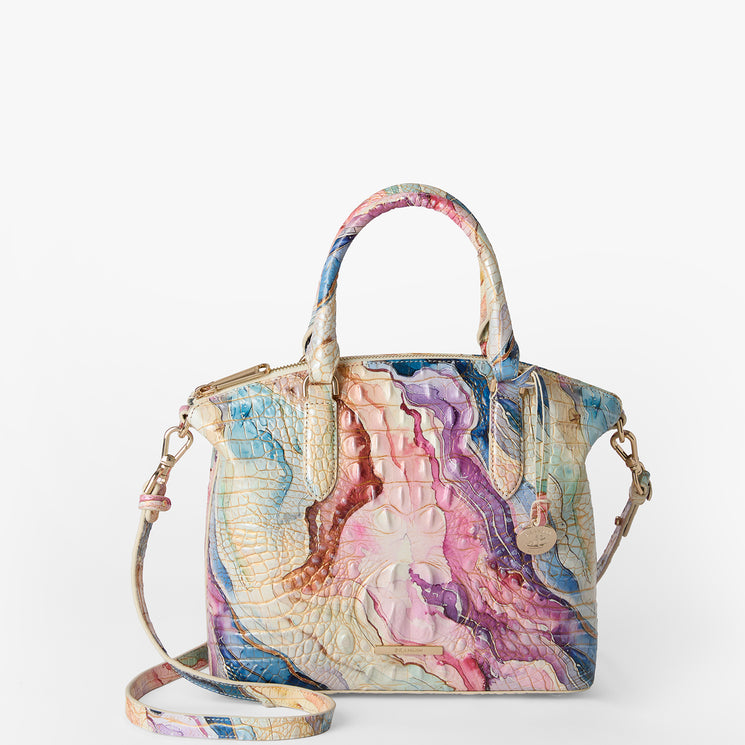 Colorful handbag with a marbled pattern on a white background. Duxbury satchel front view with strap.