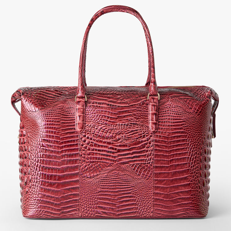 Brahmin structured large red satchel with double handles, embossed textured finish, and gold-tone hardware, shown in a front view against a white background. No strap or interior details visible.