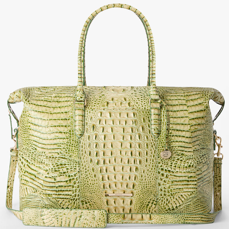 Brahmin structured handbag in pale green embossed leather with two top handles, a removable shoulder strap, gold-tone hardware, and a small gold charm. Features elegant silhouette and textured pattern. Front view shown.