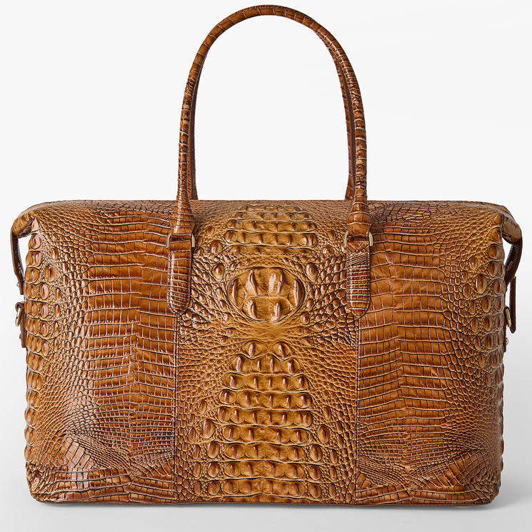 Brahmin brown satchel handbag with two top handles, embossed textured pattern, glossy finish, structured silhouette, gold-tone hardware, shown against a white background. Front and side view; interior not visible.