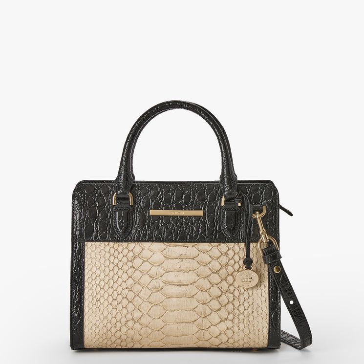 Handbag with black and beige croc pattern on a white background. Cami front view with strap.