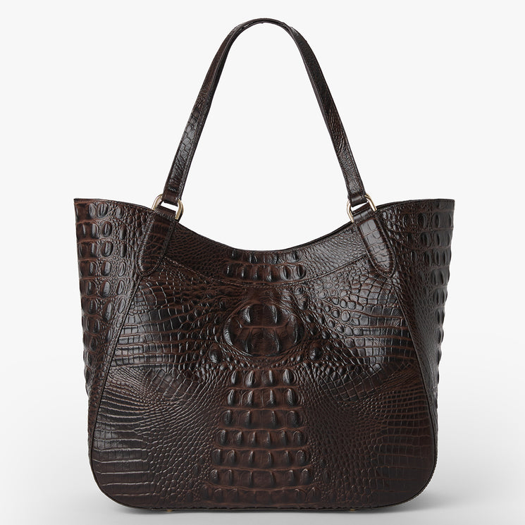 Brahmin dark brown textured embossed tote bag with two top handles, curved top edge, roomy silhouette, and subtle sheen, shown against a white background; exterior features visible grain detail.