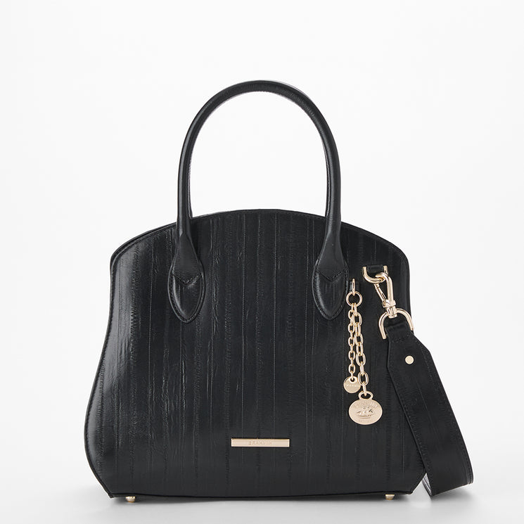 Brahmin black structured satchel with gold hardware, two top handles, detachable shoulder strap, and gold Brahmin charm. Shown on a plain white background; exterior features clean lines and a polished silhouette.