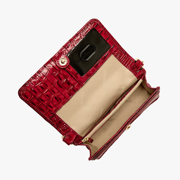 Volcanic Red Melbourne croc textured handbag on a light gray background. Minuette open top view.