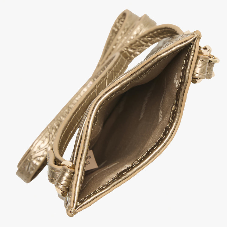 BRAHMIN Eris small crossbody phone pouch in metallic gold, top view showing long strap, structured silhouette, slip top opening and main compartment open to a fabric-lined interior.