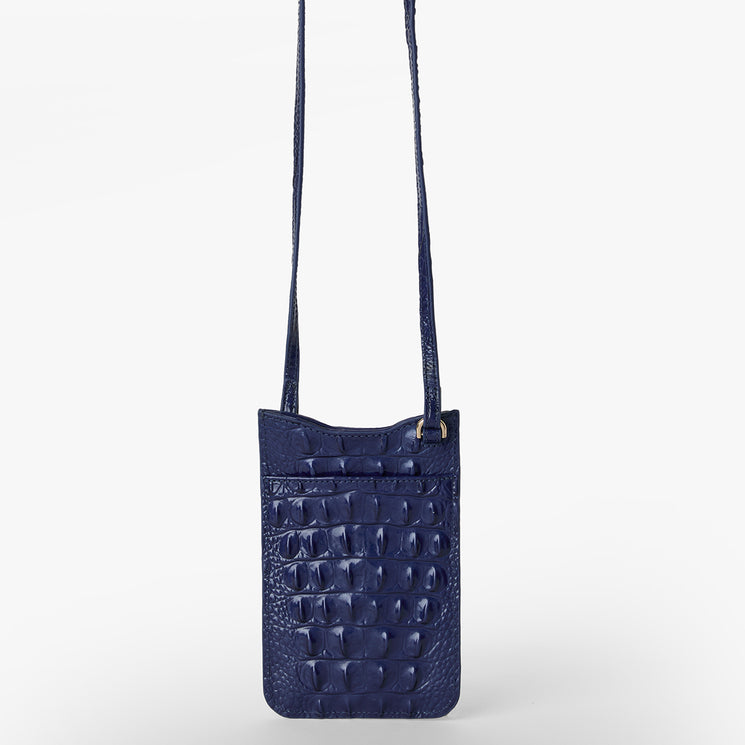 BRAHMIN Eris crossbody pouch in Midnight Blue Melbourne with textured croc-embossed pattern, slim adjustable strap, open top, and structured silhouette. Bag displayed upright against a white background.