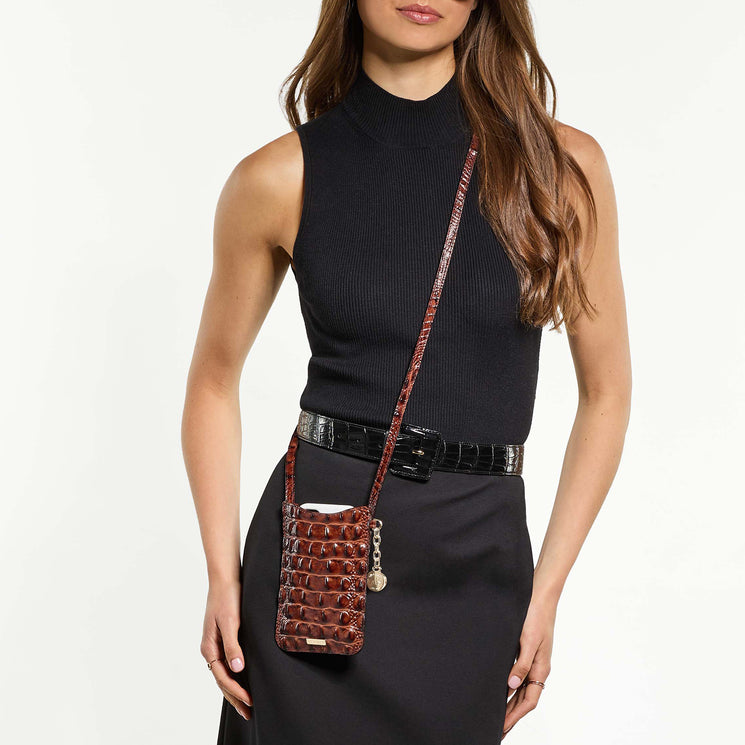 Woman wearing Eris crossbody against a white background